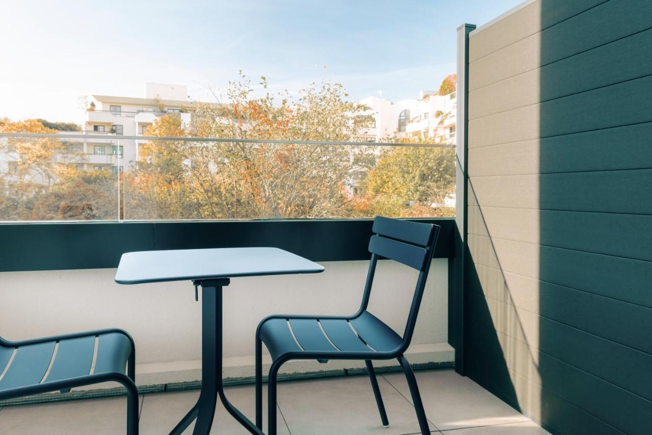 Novotel Paris Suresnes Longchamp Экстерьер фото